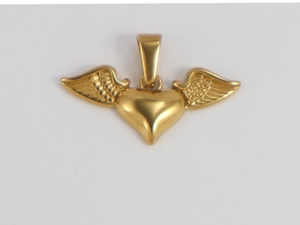 Macro shot of 18K gold plated heart pendant with wings showing polished metal texture