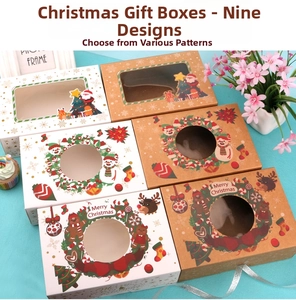 Detailed view of Christmas cupcake boxes with festive Santa and reindeer window designs