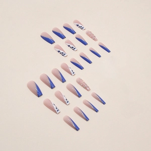 Long ballet leopard print fake nails with blue glitter and rhinestone details