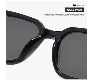 Detail of ergonomic integrated nose pads on black sunglasses for a comfortable fit