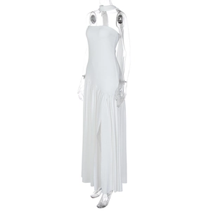 Detail view of white halter neck maxi dress with elegant leg slit and flowing fabric