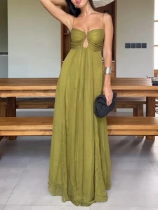 Olive green spaghetti strap maxi dress with sexy cut-out design and flowing skirt