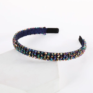 Detailed view of handmade double-row crystal headband with iridescent AB coating
