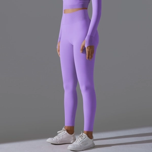 Detail view of lavender seamless yoga set showing thumbhole cuffs and high waist fit