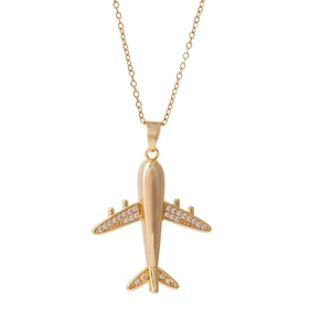 Golden airplane pendant necklace with crystal zircons on a delicate link chain