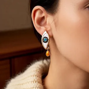 Vintage bohemian eye earrings with turquoise detail and amber teardrop pendant