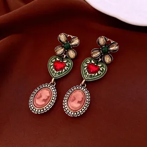 Vintage Baroque drop earrings with green enamel heart and pink cameo lady portrait