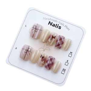 Handmade cat eye press-on nails with purple butterfly and classic plaid pattern