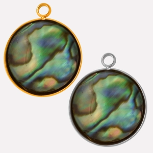 Macro view of gold and silver stainless steel pendants featuring natural abalone shell inlay
