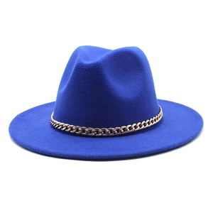 Close-up of navy blue wool fedora hat with gold and silver metallic chain detail