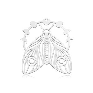 Detailed view of silver stainless steel moth pendant with celestial moon phase cutouts