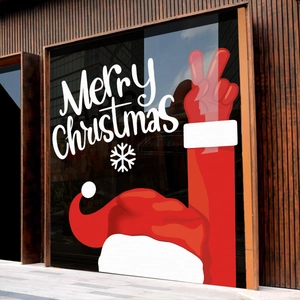 Festive Merry Christmas window sticker with Santa hat and snowflake patterns on glass