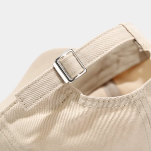 Adjustable beige cotton baseball cap with silver metal buckle and quality stitching