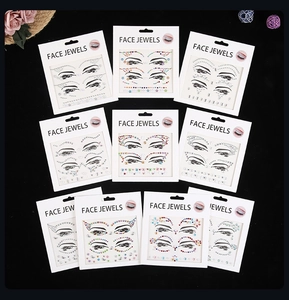 Set of 10 assorted adhesive face jewels with colorful rhinestones on black background