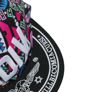 Detail of 3D embroidery and hip-hop graffiti patterns on a snapback baseball hat