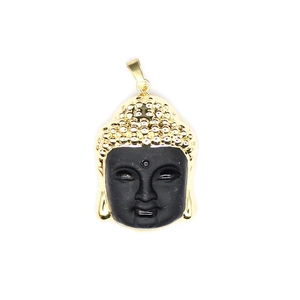 Retro crystal Buddha head pendant with gold copper rim on a minimalist white background