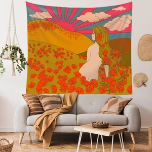Detail of Bohemian wall tapestry with artistic female illustration in cozy living room decor