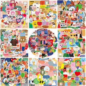 Close-up of nine cute Korean bear stickers featuring colorful cartoon animals and food