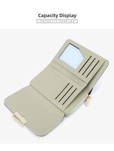 Detail view of the pale green wallet capacity with card slots and a zipper pocket
