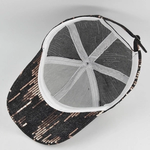 Detail view of the reinforced inner stitching and adjustable back strap of the sequin baseball cap