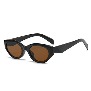 Retro cat-eye sunglasses with polygon black frame and brown lenses for UV protection