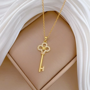 Star cross key necklace in 18k gold plating with brilliant diamonds and velvet box