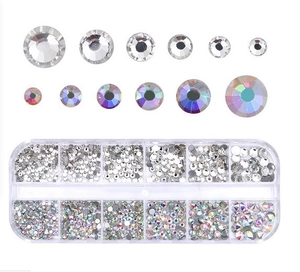 Detail of 12-slot organizer with clear and AB aurora nail art rhinestones in various sizes