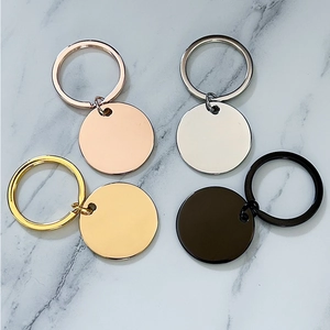 Polished round blank stainless steel keychains in gold, rose gold, silver, and black