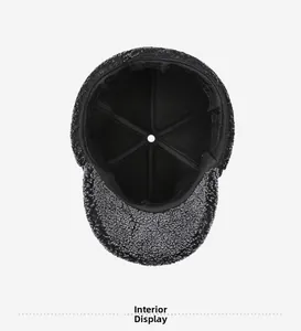 Detailed interior view of winter hat showing warm fleece lining and stitching structure