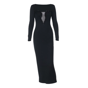 Detailed view of the elegant beaded neckline and sequin trim on this black fishtail dress