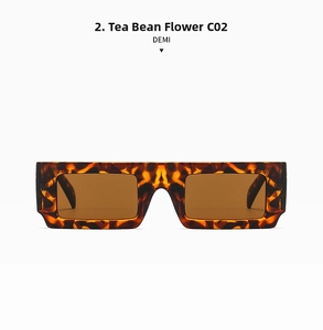 Detail of retro rectangular sunglasses in demi tortoiseshell pattern with brown lenses