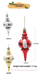 Detailansicht von rotem, goldenem und silbernem Christbaumschmuck mit Maßen und Gewicht