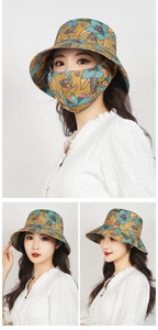 Detail of floral wide brim sun hat with matching protective face mask in mustard yellow