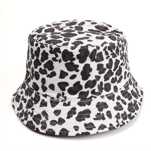 Detail of black and white leopard print bucket hat with reinforced stitching on the brim