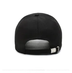 Rear view of black cotton canvas baseball cap featuring adjustable silver metal buckle