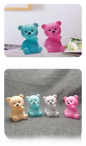 Detailed view of cute bear night lights in pink, blue, yellow, and white matte finishes