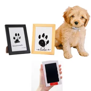Detail of no-mess inkless ink pad and DIY picture frame for pet paw prints and handprints