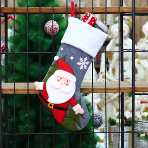 Gray felt Christmas stocking with plush cuff and 3D Santa Claus applique decoration