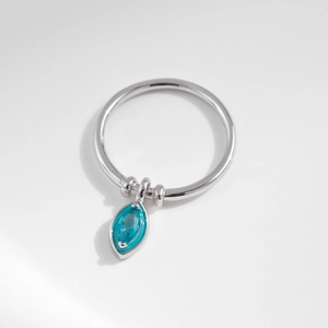 Minimalist S925 sterling silver geometric ring featuring a hanging blue oval gemstone