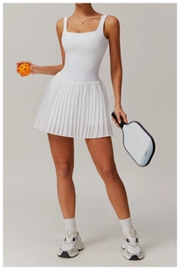 White pleated tennis dress with racerback design and sweat-wicking fabric for gym sports