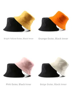 Detail showing various colors of double-sided cotton bucket hats with inner black lining