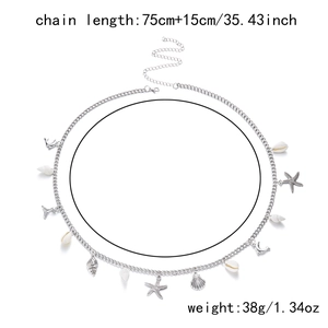Detailed view of ocean style waist chain with starfish shells and pearl tassel pendants