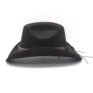 Detail of black felt fedora hat featuring a brown leather strap with silver metal rivets