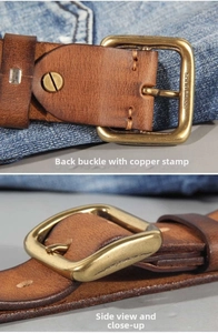 Detail view of vintage brown leather belt with solid brass buckle on denim fabric