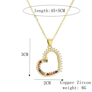 Detailed view of gold heart necklace with dimensions and materials listed for easy reference