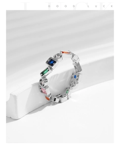 Macro shot of s925 silver ring featuring geometric rainbow cubic zirconia stones