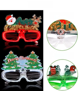 Close-up of LED Christmas glasses with festive patterns and power switch detail
