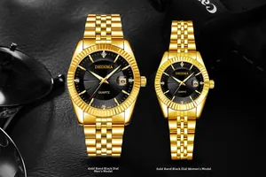 Detail of gold luminous quartz watch for couples with black dial and date window