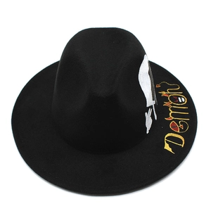 Close-up of black wool fedora featuring Demon embroidery and street style graphics