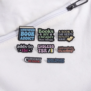 Set of 8 colorful enamel book pins for bags and clothes with creative reading slogans